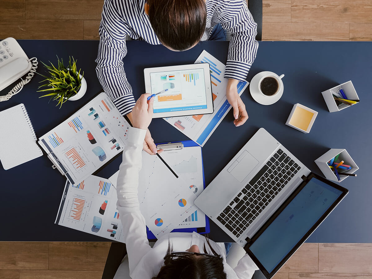 top-view-of-managers-women-discussing-financial-account