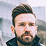 young-successful-bearded-business-man-outdoor-usin
