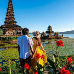 young-couple-tourist-relaxing-and-enjoying-the-beach1